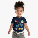 Child wearing a navy blue t-shirt with a colorful graphic and text on a white background