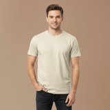 Man wearing a plain off-white t-shirt against a brown background