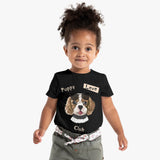 Child wearing a black t-shirt with a dog graphic and text on a white background