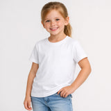Young girl wearing a plain suvin white t-shirt and blue jeans on a light gray background